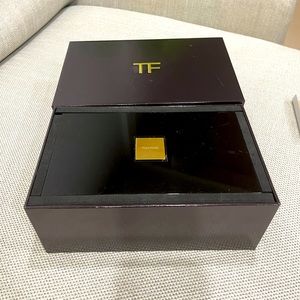 Empty Tom Ford lips and boys box